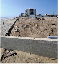 The Seawall is getting replaced on the lot South of us