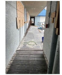 Decking installation for the 6th floor walkway slab