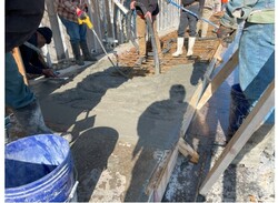 In-progress concrete placement for the first truck