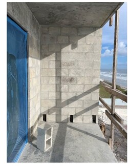Block wall installation on the 4th floor